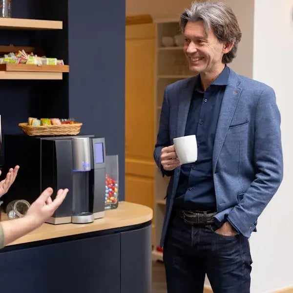 Man by the coffee machine