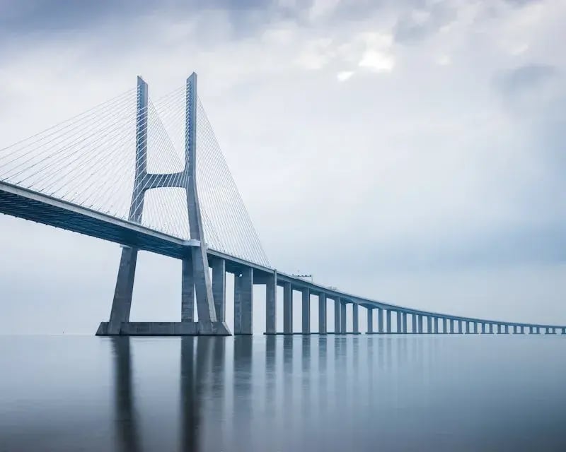 Bridge in cloudy sky